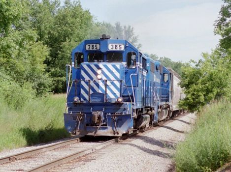 GLC 385 heads north with a freight train near Whitmore Lake, MI  2009  [Nathan Nietering]